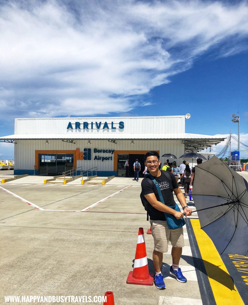 Umbrellas provided upon arrival in Boracay Airport The New Caticlan Airport article of Happy and Busy Travels