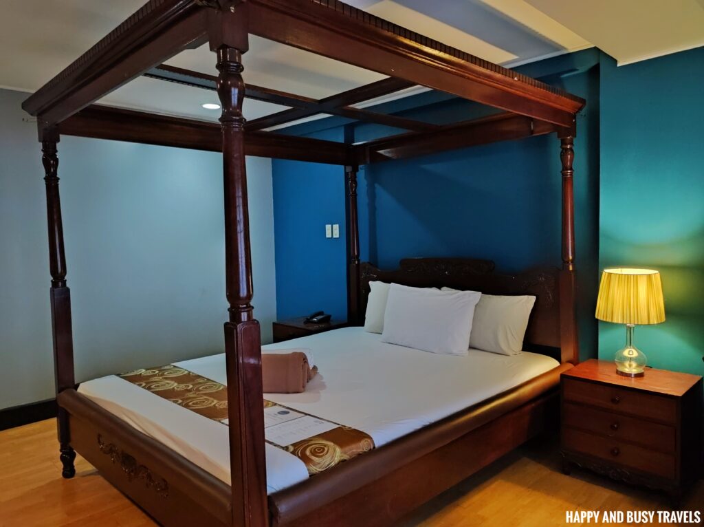 deluxe king room bed Arzo Hotel Manila - Where to stay in Paco Manila - Happy and Busy Travels