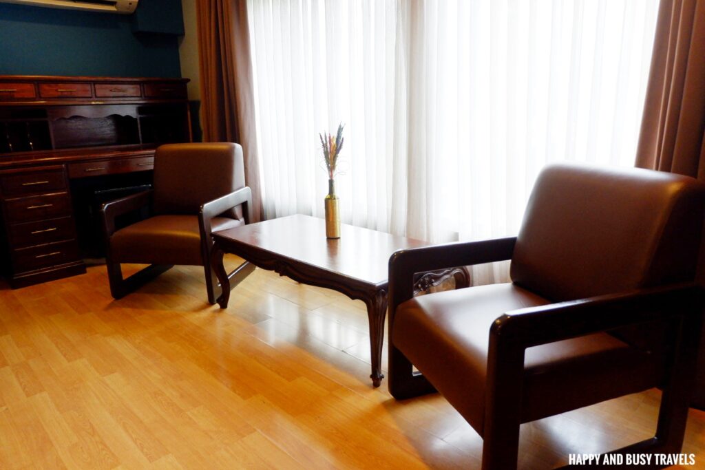 deluxe king room chairs and table Arzo Hotel Manila - Where to stay in Paco Manila - Happy and Busy Travels