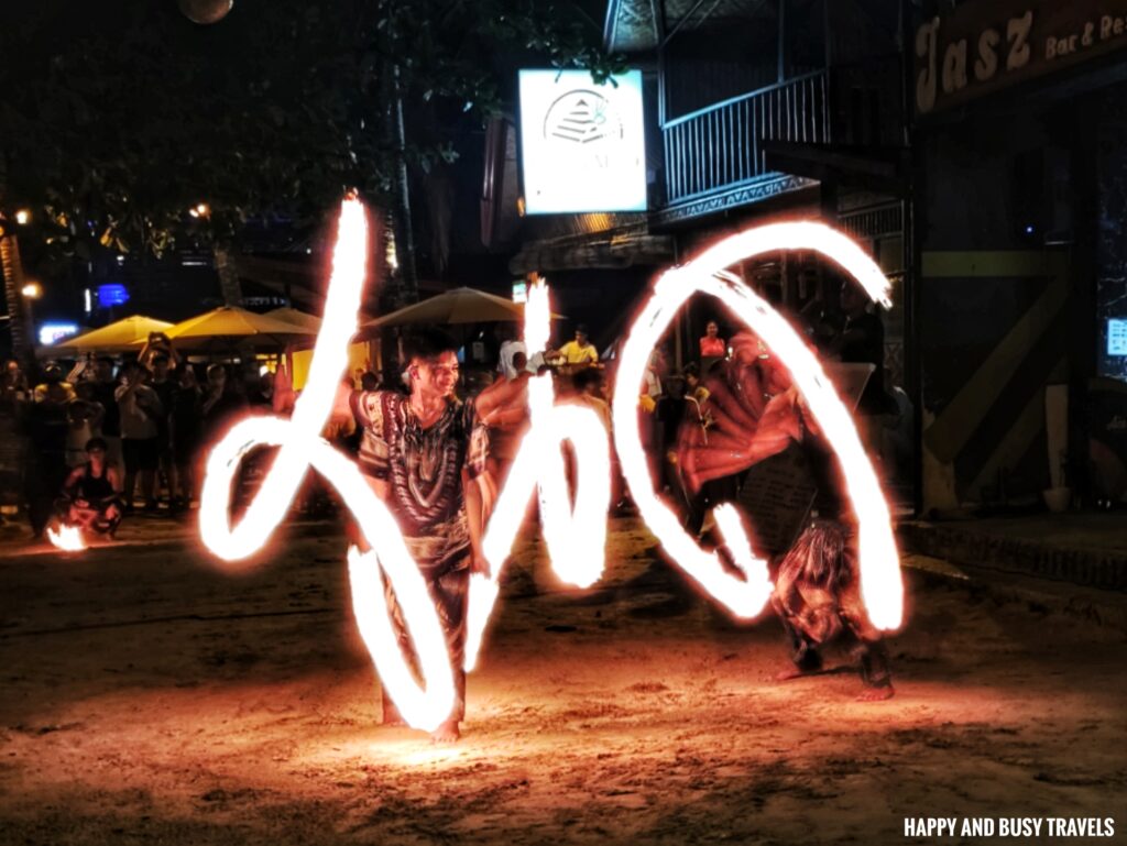firedancers near the fun features and amenities Villa Tomasa Alona Beach Panglao Bohol - Where to stay Affordable resort hotel beachfront - Happy and Busy Travels to Bohol