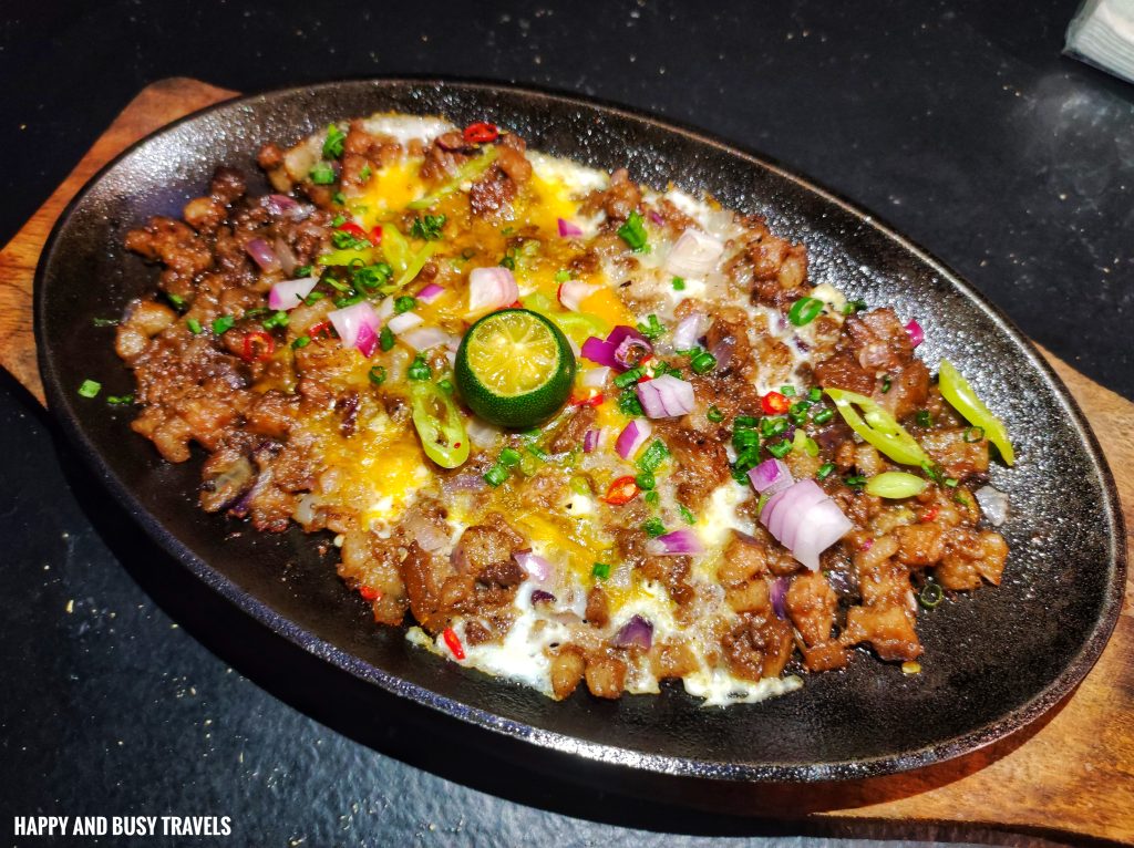 sizzling sisig with egg Bobschibog Restobar - VIP KTV Karaoke Videoke party place where to eat restaurant imus cavite - Happy and Busy Travels