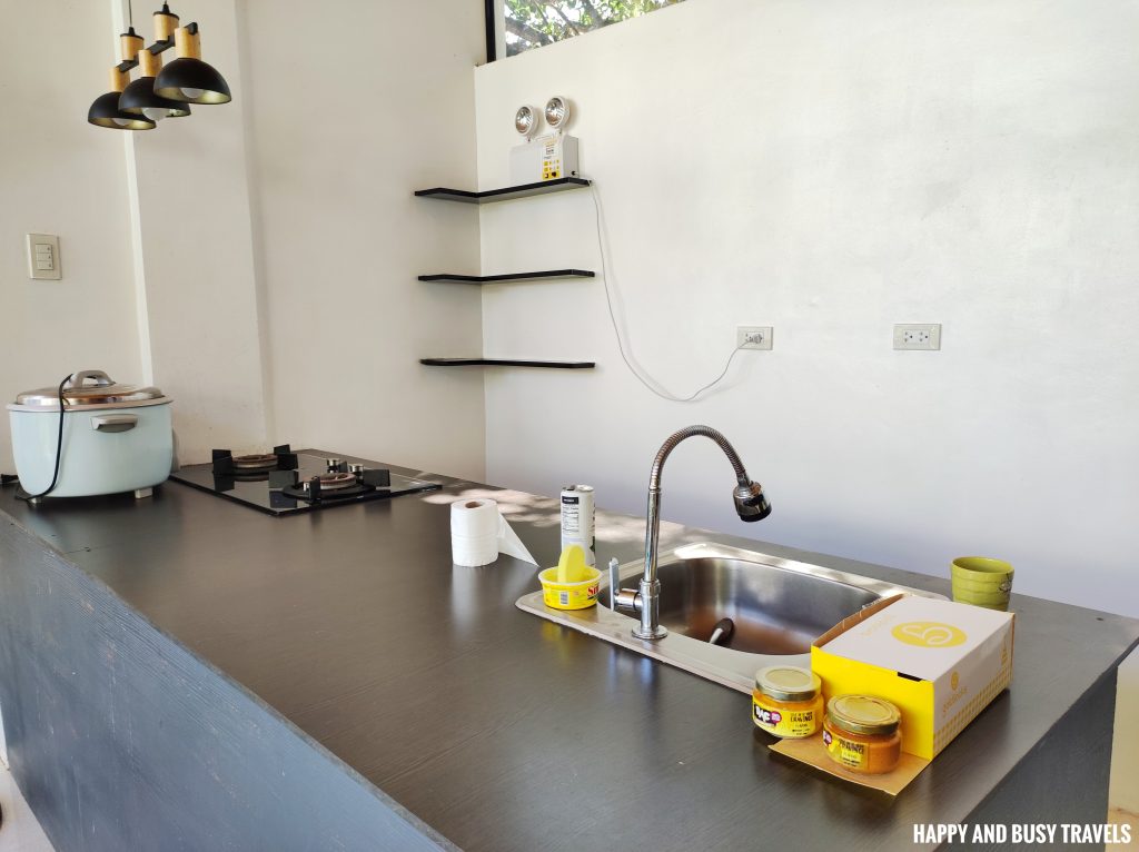sink kitchen Leaf Residences 8 - kitchen refrigerator water dispenser microwave - Tagaytay staycation house private villa swimming pool for rent airbnb where to stay - Happy and Busy Travels
