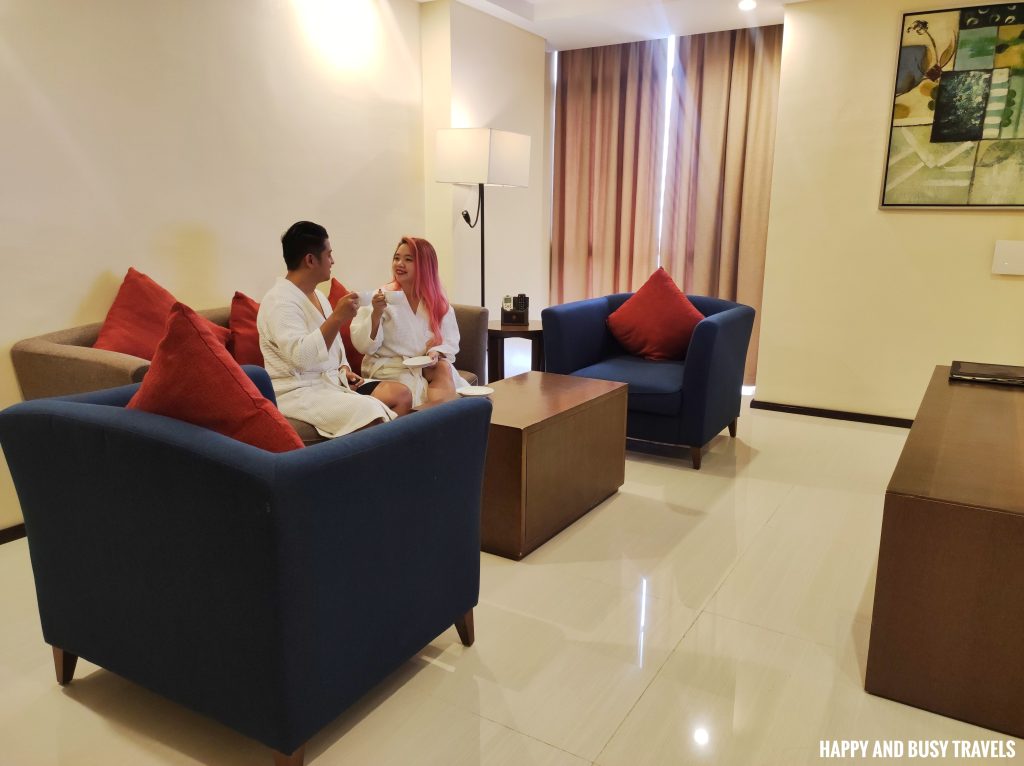 suite room living area sofa Golden Phoenix Hotel - Where to stay near MOA Mall of asia Pasay - Happy and Busy Travels