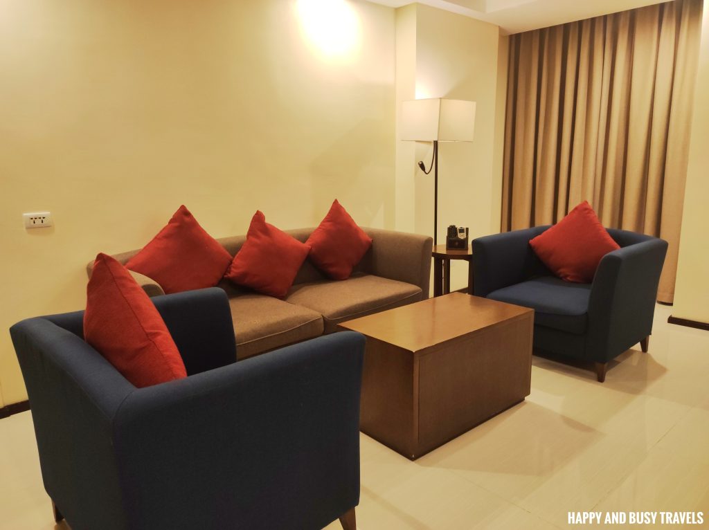 suite room living area Golden Phoenix Hotel - Where to stay near MOA Mall of asia Pasay - Happy and Busy Travels