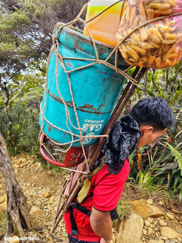 Climbing mount kinabalu 65 -porters going down second day how to climb tips kota kinabalu sabah malaysia highest peak south east asia mountain - Happy and Busy Travels